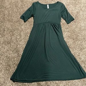 Medium Dark Green Zenana Outfitters mid length dress with quarter sleeves